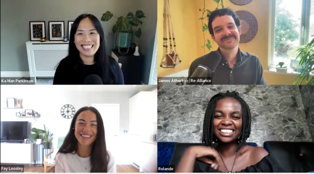 A video call with four smiling people, each in their own space. Two are in the top row and two in the bottom, all looking at their webcams. Backgrounds include home decor, plants that hint at permaculture principles, and a window—reflecting a shared interest in regenerative humanitarian response.